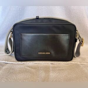 Michael Kors Black and Gold Woman’s Messenger Bag